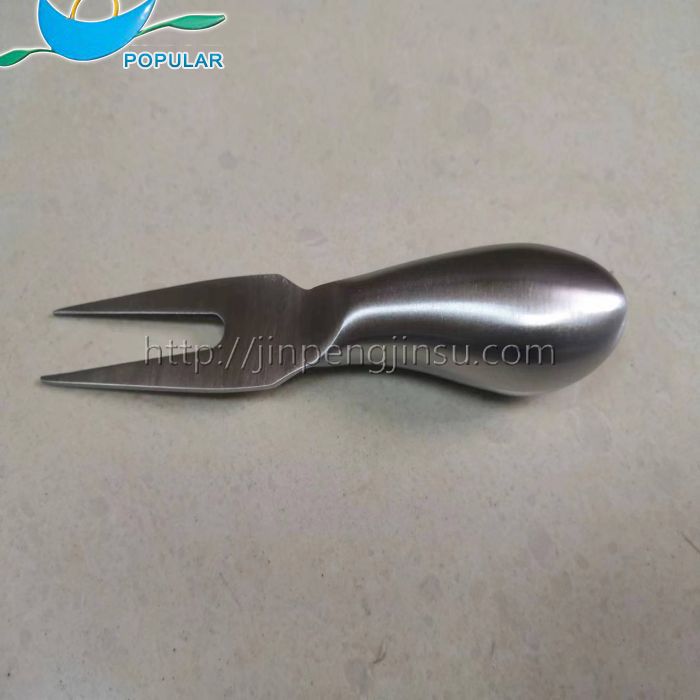 Cheese fork with hollow handle Cheese fork with hollow handle