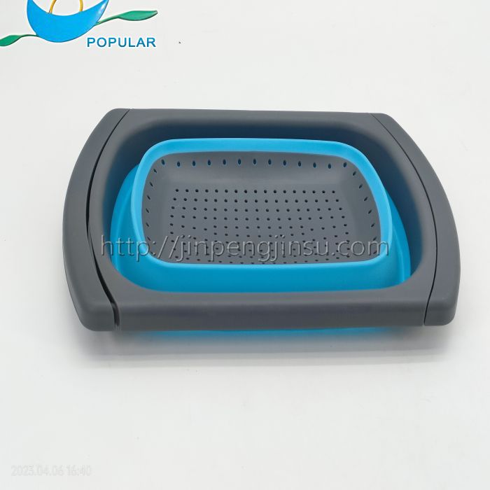 Collapsible colander basket with drag handle Collapsible colander basket with drag handle
